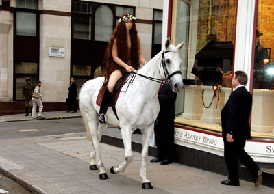 naked woman on horseback