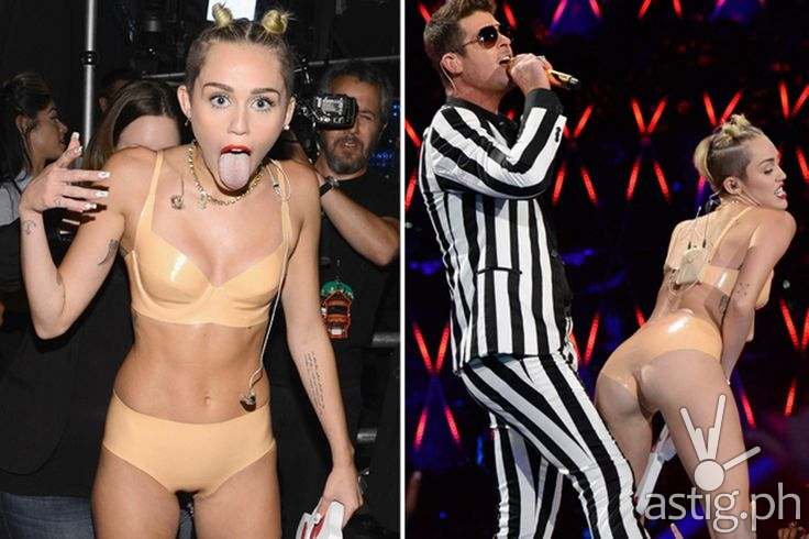 becky jackowski recommends miley cyrus strap on pic