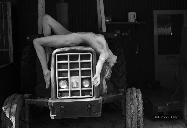 clayton carlton add nude on a tractor photo